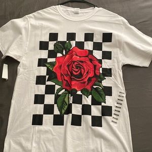 white tee with red rose and checker background
